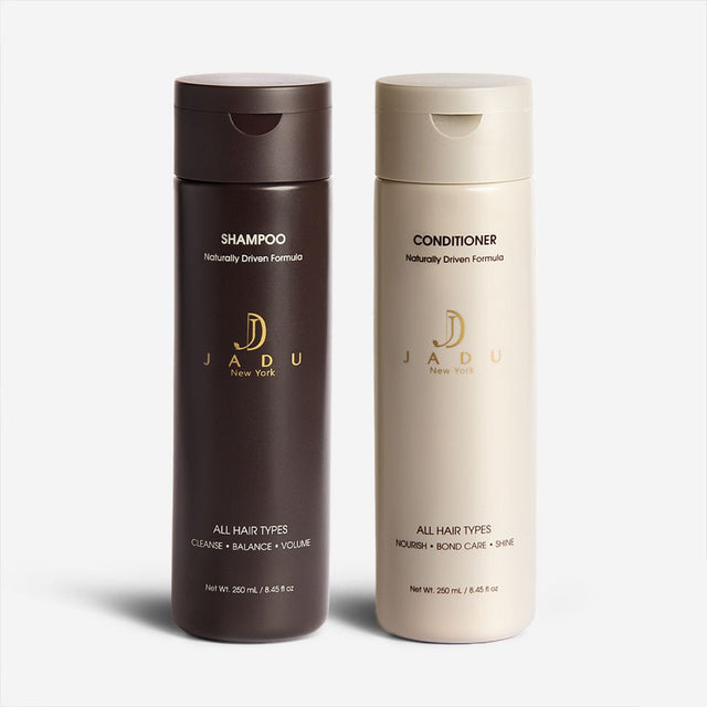A full-size duo of Jadu Shampoo and Conditioner, 250 mL each.