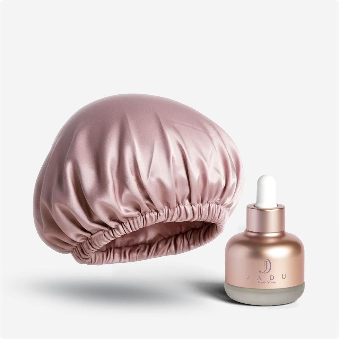 Jadu Split Ends Care hair oil paired with a dusty rose silk bonnet.