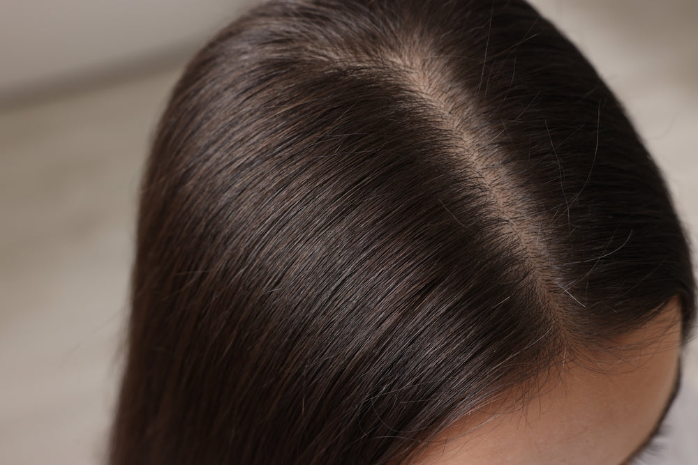 Healthy scalp close-up showing balanced scalp environment and root health support