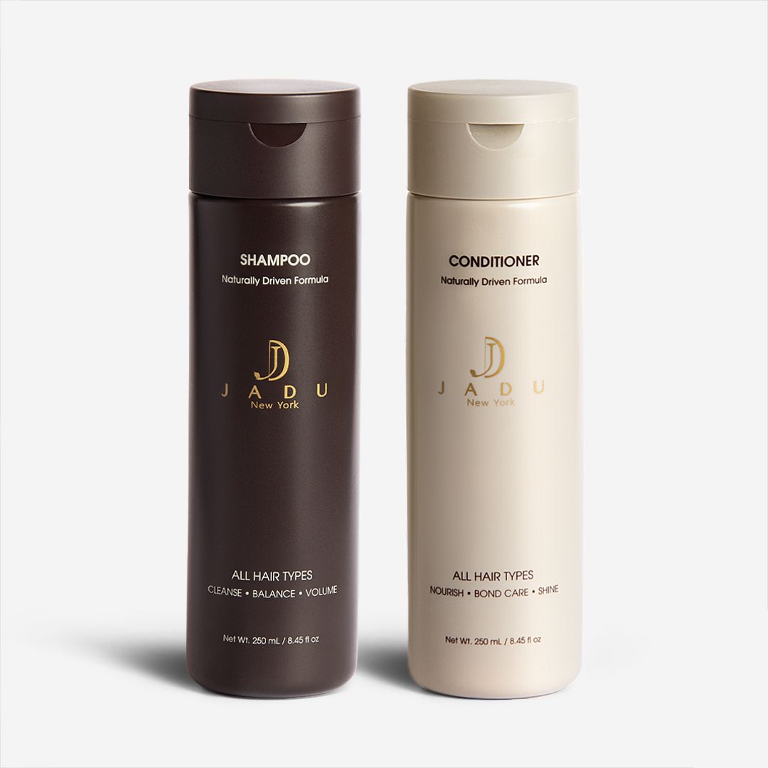 A full-size duo of Jadu Shampoo and Conditioner, 250 mL each.