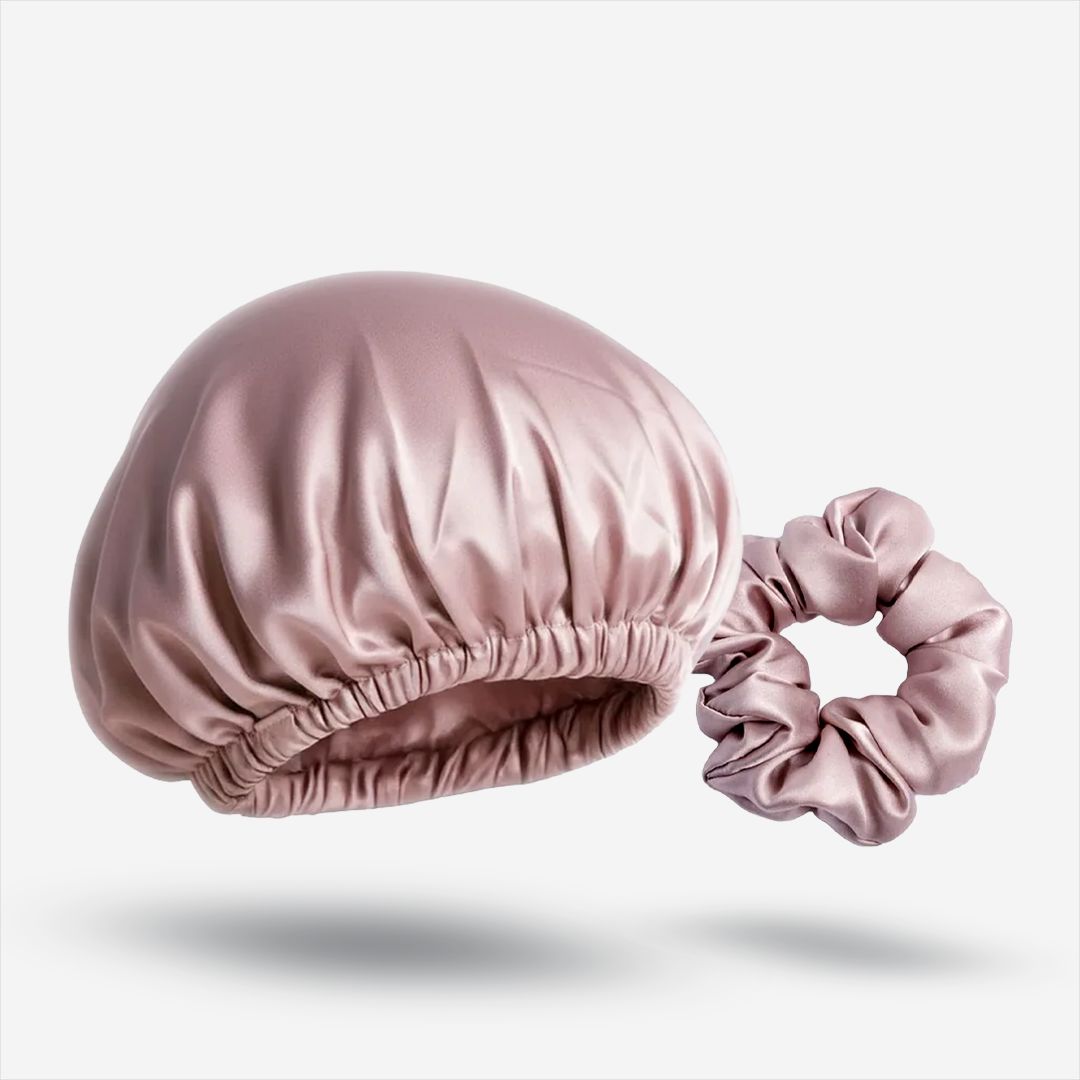 A dusty rose silk bonnet and matching scrunchie for overnight hair protection.