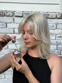 Applying Split Ends Care to bleached hair