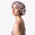 Silk bonnet being worn by a model to reduce frizz and damage